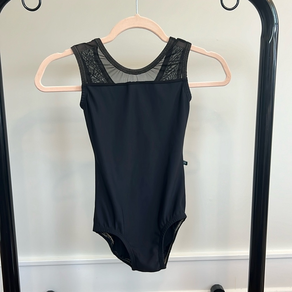 Lucky Leo Women’s black leotard size xs. Excellent condition.